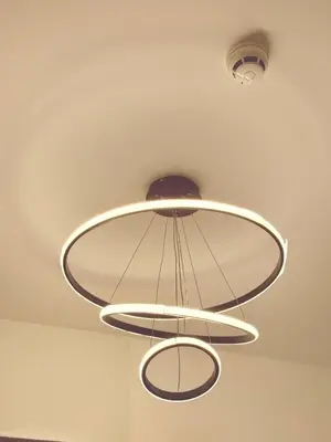 aandelier hanging from the ceiling in a room at Shore 2 Tower 1 Eliel Staycation in Manila
