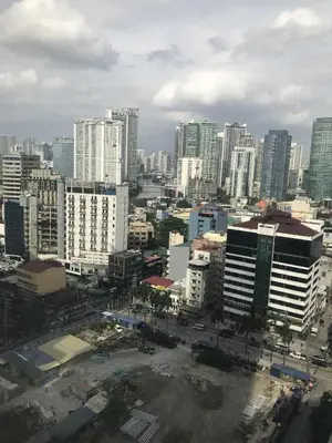 a city with a lot of tall buildings at A venue Residences 2013 in Manila