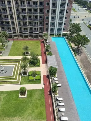 an overhead view of a swimming pool in a building at WP1102 Facing pool view near MOA in Manila
