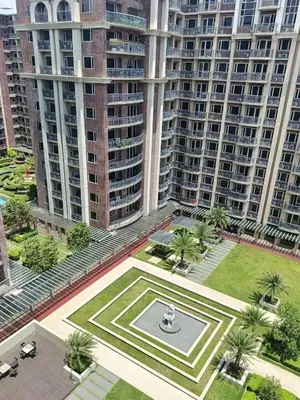 an aerial view of a park in front of tall buildings at WP1102 Facing pool view near MOA in Manila