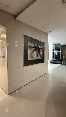 a room with a wall with a painting on it at Princeton condo near gilmore STA Wifi Netflex in Manila