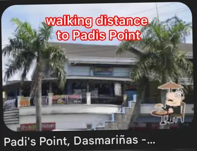 a sign with awalkying distance to patties point at Von Home Sweet Home in Dasmariñas