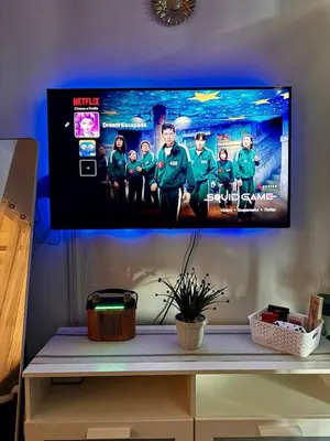 a flat screen tv on top of a shelf at Dream Escapade in Manila