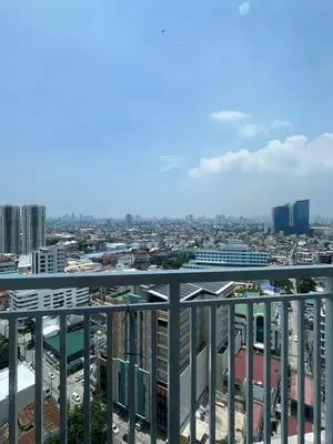 a view of a city from the top of a building at Lush Residence in Manila