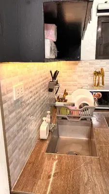 a kitchen with a sink and a counter top at Santa Cosy Villa suite-B Fast Wi-Fi, Netflix Included Split system Air-con & Hot Shower Close to Enchanted Kingdom in Santa Rosa