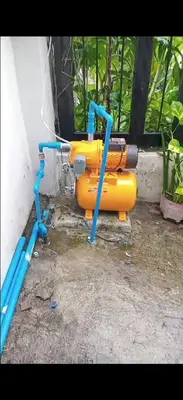 a group of yellow and blue pipes sitting next to a wall at Santa Cosy Villa suite-B Fast Wi-Fi, Netflix Included Split system Air-con & Hot Shower Close to Enchanted Kingdom in Santa Rosa