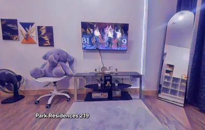 a room with a desk and a teddy bear sitting on a chair at PARK RESIDENCE Unit 219, SM City Santa Rosa, Laguna, by SMDC in Ibaba