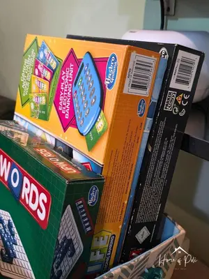 a stack of lego books stacked on top of each other at Home of Poli - 1BR with FREE Netflix & WiFi in Manila