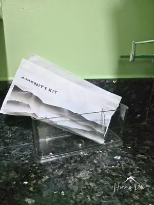 a paper bag sitting on top of a counter at Home of Poli - 1BR with FREE Netflix & WiFi in Manila