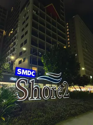 a sign for a store in front of a building at Philhaus Staycation 2025 in Manila