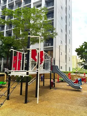 a playground with a slide in a park at Philhaus Staycation 2025 in Manila