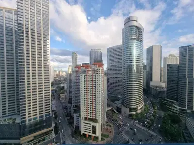 a view of a city with tall buildings at 5 minutes to Jazz Mall Studio-type condo100mbps in Manila
