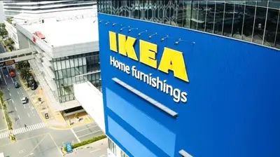 a kea sign on a building in a city at staycation condo one bedroom balcony w pool view near SMX SM MOA IKEA NAIA DFA OCEAN PARK in Manila