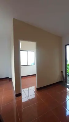 an empty room with a door and a tile floor at Amaia Escapes Calamba in Calamba