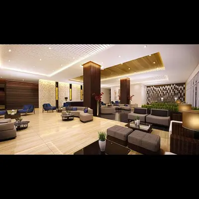 a large living room with couches and chairs in a building at Place To Stay Near US Embassy Front Of Manila Bay in Manila