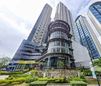 a tall building in a city with tall buildings at NEW AND AFFORDABLE 2BR LOFT at THE FORT BGC 200mbps WiFi in Manila
