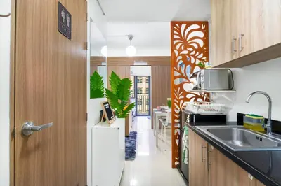 a kitchen with a sink and a counter top at 1BR Staycation at Shore 2 Tower 3 in Manila