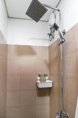 a shower in a bathroom with a shower head at 1BR Staycation at Shore 2 Tower 3 in Manila