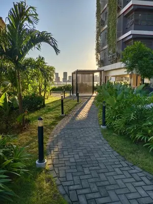 a brick walkway in front of a building at Chino Roces Makati - No Parking - Red Residences in Manila
