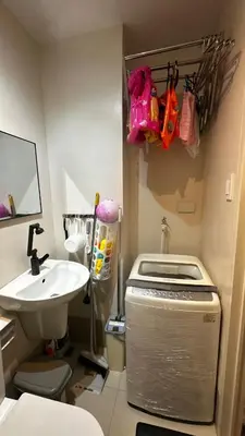 a small bathroom with a sink and a toilet at SplashNStay 18sqm condi near AUP,PNPA CKS College Sta Rosa Tagaytay road Silang Cavite in Puting Kahoy
