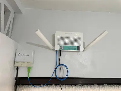 a room with a air conditioner and a wall at Cozy Hideout-Free Parking, Netflix & Arcade Games in Cainta