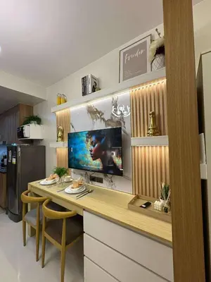 a desk with a computer on it in a kitchen at RED LUXE HAVEN Comfy stay, Netflix and Fast WiFi Ready in Manila