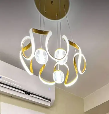 a chandelier is hanging from the ceiling at RED LUXE HAVEN Comfy stay, Netflix and Fast WiFi Ready in Manila