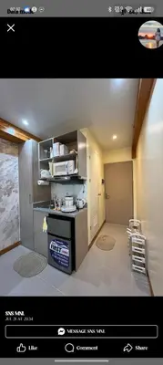 a picture of a kitchen with a stove in a room at Loft life Staycation in Manila