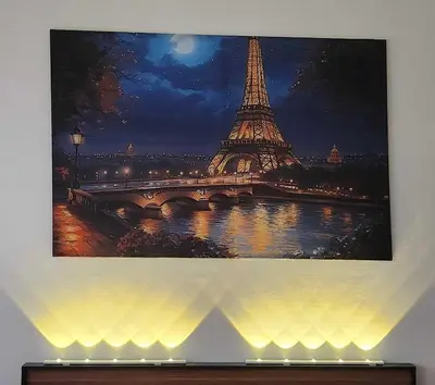 a picture of the eiffel tower at night at Colin's Suite - Hope Residences, Trece Martires in Trece Martires
