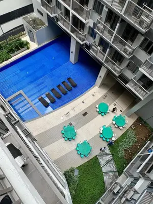 an overhead view of a swimming pool in a building at S Residences Room 910B near MOA, IKEA & NAIA by Prime Stay in Manila