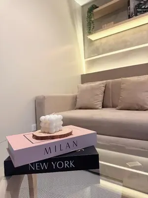 a living room with a couch and a table at Kasara Urban Residences in Pasig City - Solmera Cove in Manila