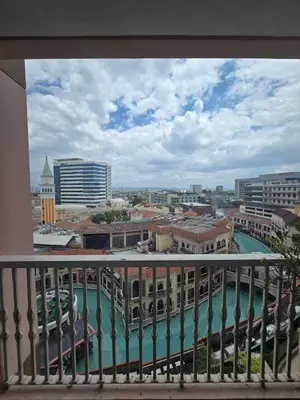 a view of a city from a balcony at Luxurious Balcony Venice Grand Canal View in Manila