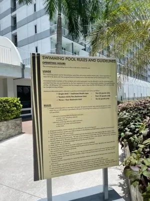 a sign for a swimming pool rules and guidelines at MOA Staycation - Shell Condo in Manila