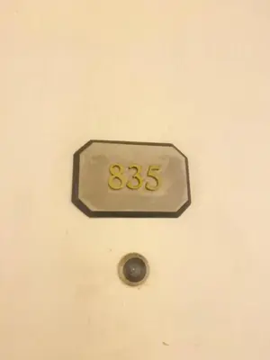 a clock on the ceiling of a room at Monarch Parksuites in Manila