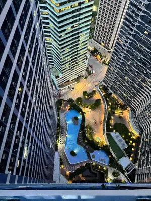 an aerial view of a city with tall buildings at The Air Residences Makati in Manila