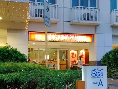 a sign in front of a long kong restaurant at Sea residences Christine prime in Manila