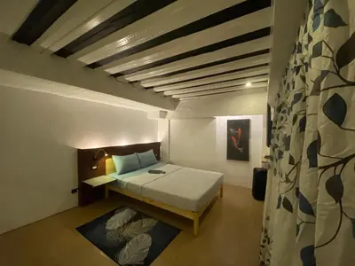 a bedroom with a bed in a room at Adorable - 2A, Chill Room in Manila