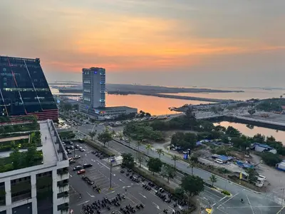 a view of a city with a river and a building at Shore Residences Banana Room with 2 Beds Good for 4 Guests Pool View Room 622 by Prime Stay in Manila