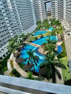 an overhead view of a swimming pool in a building at Staycation, Mall of Asia in Manila