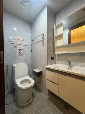 a bathroom with a toilet and a sink at Sybay suites beside okada manila near AirPort MOA COD MSV1807H in Manila