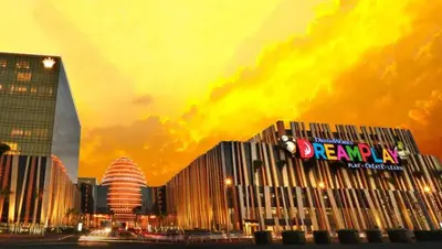 a building with a sign on it in a city at Sybay suites beside okada manila near AirPort MOA COD MSV1807H in Manila