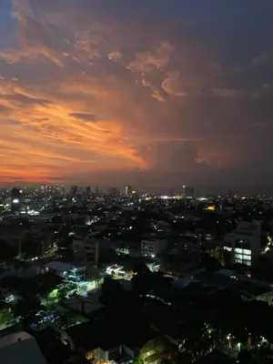 a view of a city at night at The Olive Place, Manadaluyong City in Manila