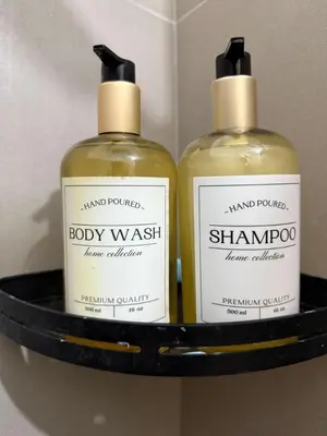 two bottles of soap sitting on a shelf at Harbour Park Residences Cozy 1BR Suite in Manila
