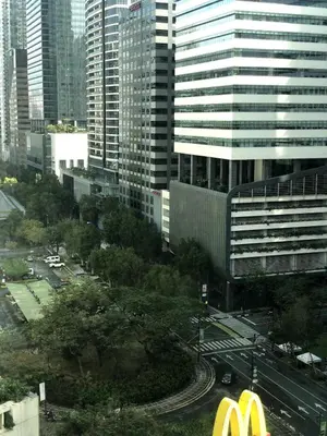 a view of a city with a mcdonalds building at Cozy House BGC 1BR up to 6 Guests 100MBPS WiFi in Manila
