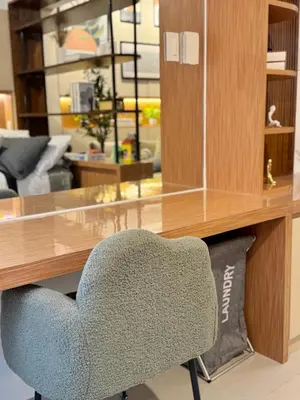 a desk with a chair in a room at 1-BR condo unit near Rockwell, Poblacion in Manila