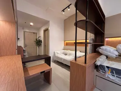 a room with a bedroom with a bed in it at 1-BR condo unit near Rockwell, Poblacion in Manila