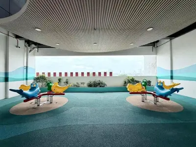 a room with three rocking horses on the floor at 1-BR condo unit near Rockwell, Poblacion in Manila