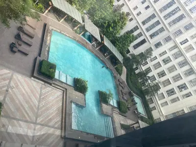 an overhead view of a swimming pool in a city at 3ms and jacob havens in Manila