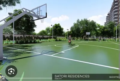 a man standing on a basketball court at Minimalist stay in Satori Residences Pasig City in Manila