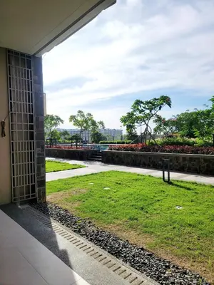 a view of a park from the outside of a building at Minimalist stay in Satori Residences Pasig City in Manila